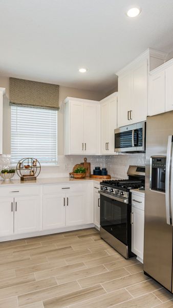 Representative furnished interior of a home built from the Caicos by Taylor Morrison in Esplanade at Kingston, Estero (Image 11). Representative furnished interior of a home built from the Caicos by Taylor Morrison in Esplanade at Kingston, Estero (Image 11).