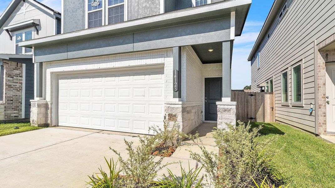 Front exterior of a new home in Aldine Pines, Houston, TX, highlighting curb appeal (Image 24). Front exterior of a new home in Aldine Pines, Houston, TX, highlighting curb appeal (Image 24).