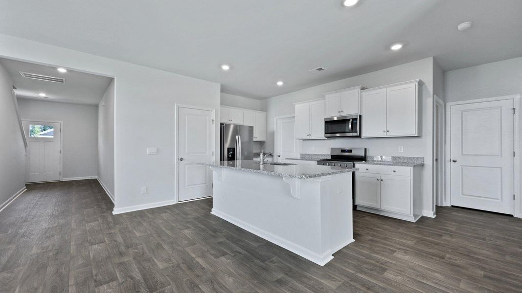Furnished interior view inside a new home in Pine Hills at Cane Bay, Summerville (Image 6).