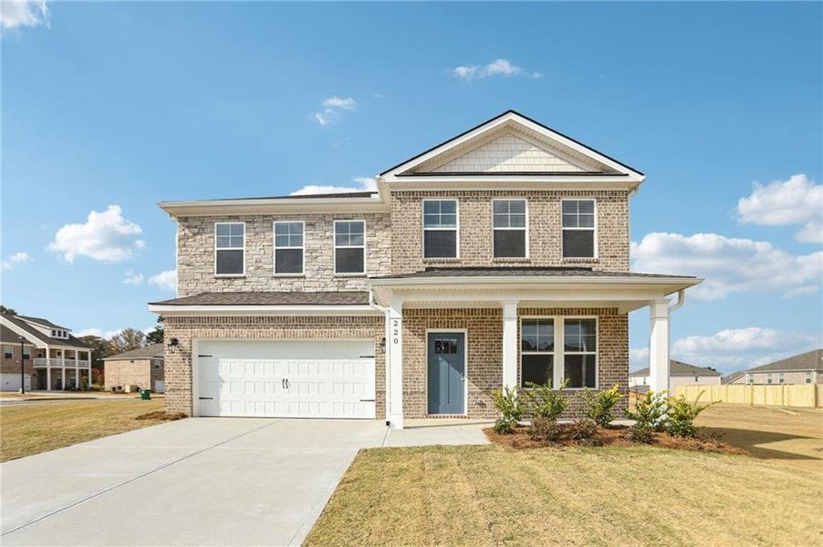 Front exterior of a new home in Burchwood, Stockbridge, GA, highlighting curb appeal (Image 1). Front exterior of a new home in Burchwood, Stockbridge, GA, highlighting curb appeal (Image 1).
