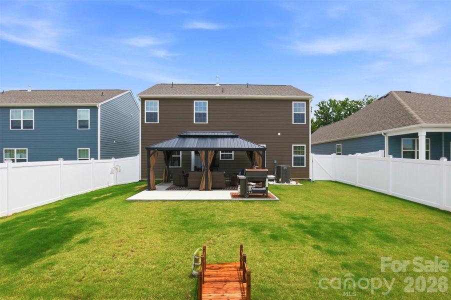 Exterior details and patio area of a home in Secrest Commons, Monroe (Image 24).