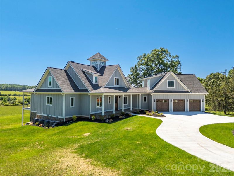 Front exterior of a new home in , Tryon, NC, highlighting curb appeal (Image 23).