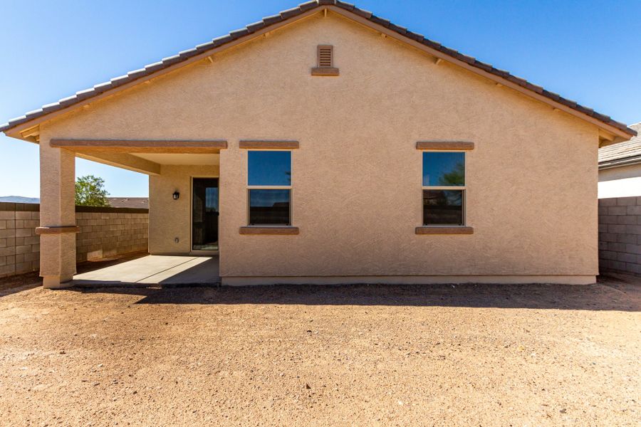 Exterior details and patio area of a home in The Villages at North Copper Canyon, Surprise (Image 4).