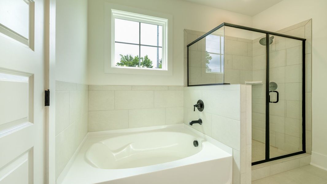 Representative furnished interior of a home built from the Hanover by D.R. Horton in The Village at Sandy Plains, Marietta (Image 9).