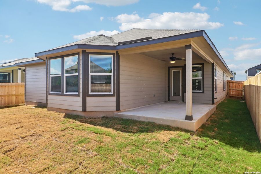 Exterior details and patio area of a home in Estancia Ranch - Premier Series, San Antonio (Image 4).