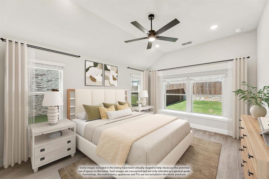 Bedroom with vaulted ceiling, ceiling fan, large windows, and light wood floors