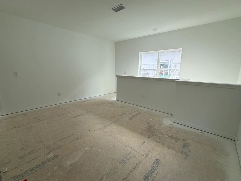 Loft featuring the AW Collection® Rosemary - Flexible living wrapped in warmth and wood.