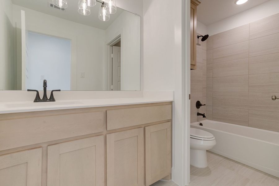 Representative furnished interior of a home built from the Longview by Graham Hart Home Builder in Bear Ridge, Burleson (Image 8).