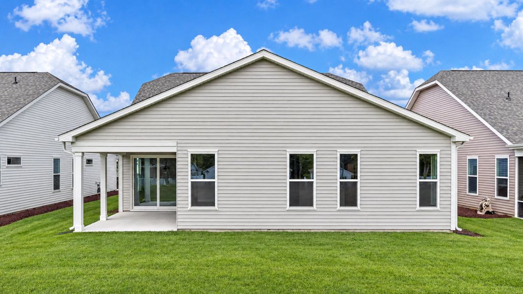 Exterior details and patio area of a home in Bridgewater - Shorehaven Village, Little River (Image 3).