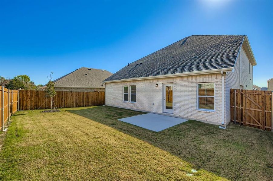 Exterior details and patio area of a home in Summerwood Estates, Red Oak (Image 19).