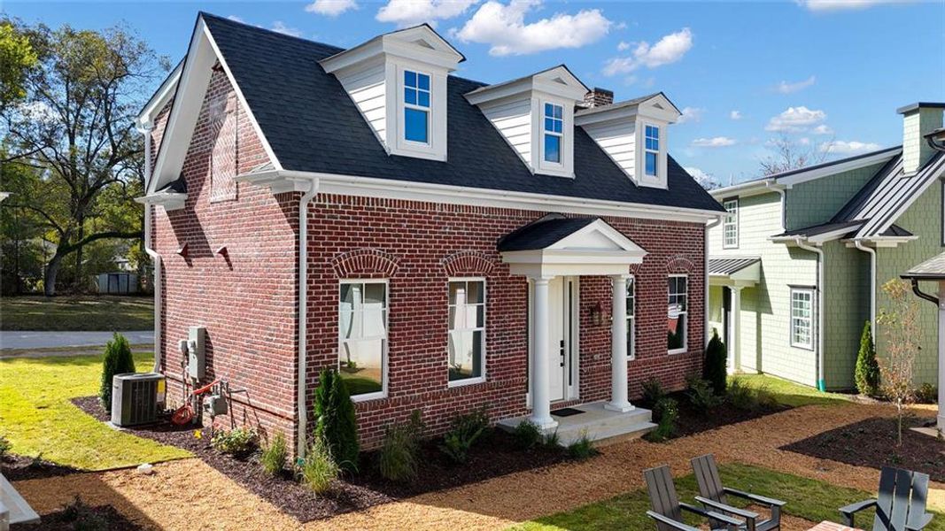 Front exterior of a new home in , Senoia, GA, highlighting curb appeal (Image 1). Front exterior of a new home in , Senoia, GA, highlighting curb appeal (Image 1).