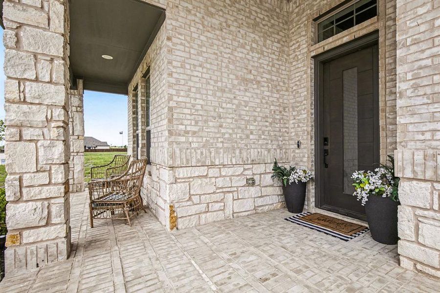 Exterior details and patio area of a home in Silo Mills, Joshua (Image 27).