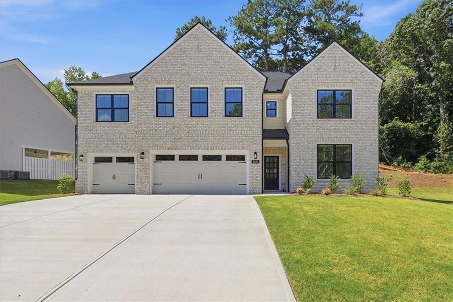 Front exterior of a new home in , Lawrenceville, GA, highlighting curb appeal (Image 30).