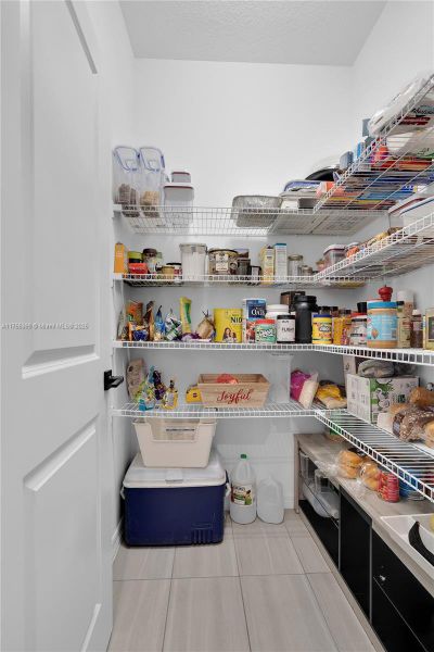 Furnished interior view inside a new home in , Tamarac (Image 19).