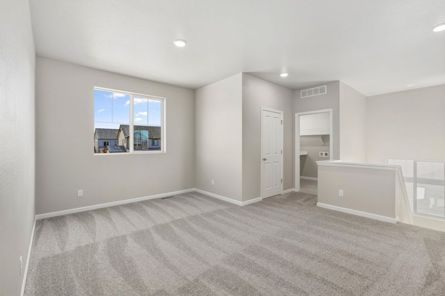 Spacious, unfurnished interior of a new home in Highlands Preserve, Mead (Image 14).
