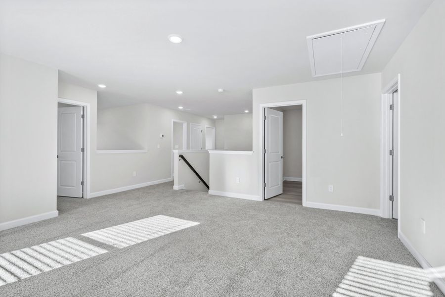 Spacious, unfurnished interior of a new home in Waterside - Coastline Series, Longs (Image 24).