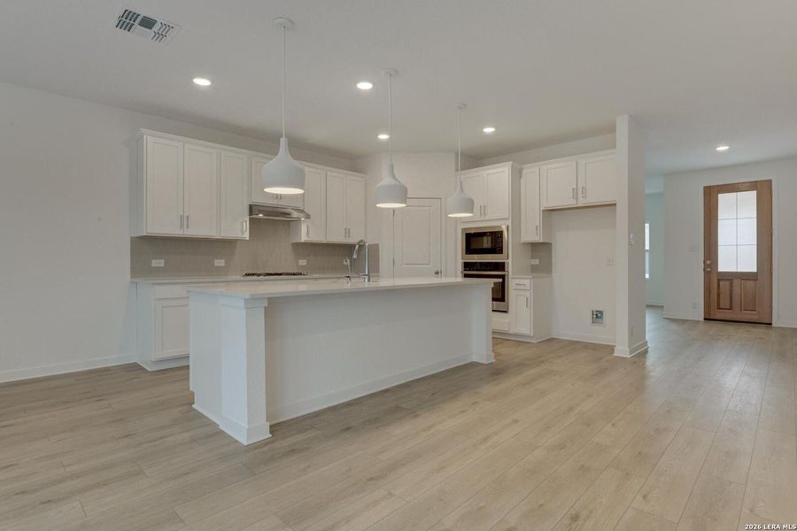 Furnished interior view inside a new home in Nopal Valley, San Antonio (Image 10).