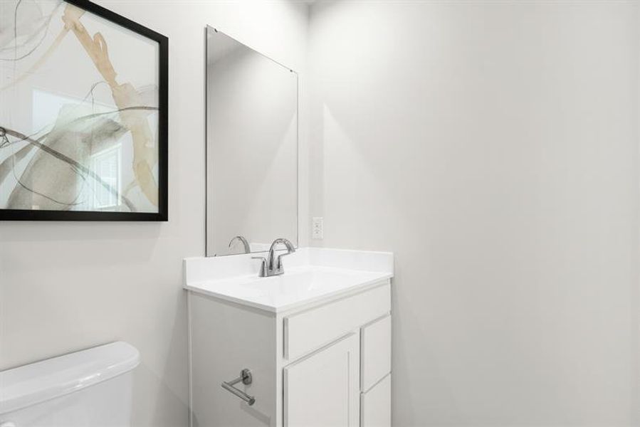 Representative furnished interior of a home built from the Reese by Ryan Homes in Middle Creek Village Coastal Cottages & Villas, Bolivia (Image 18).