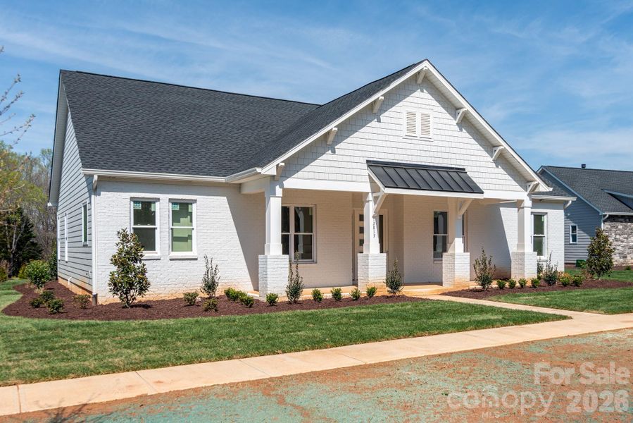 Front exterior of a new home in Bailey's Glen, Huntersville, NC, highlighting curb appeal (Image 9).