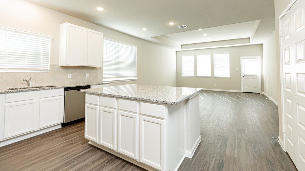 Kitchen to Dining Area and Family Room