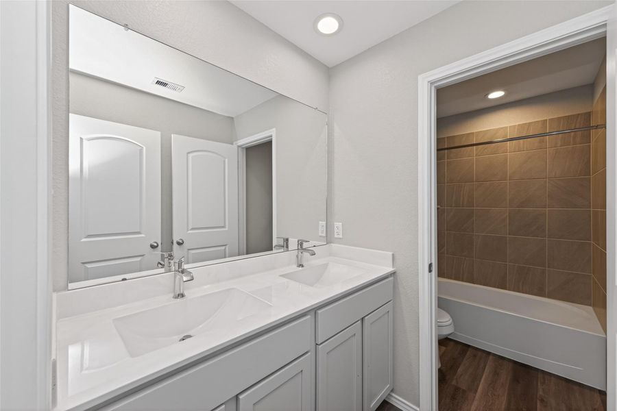 Furnished interior view inside a new home in Water Crest on Lake Conroe, Conroe (Image 11).