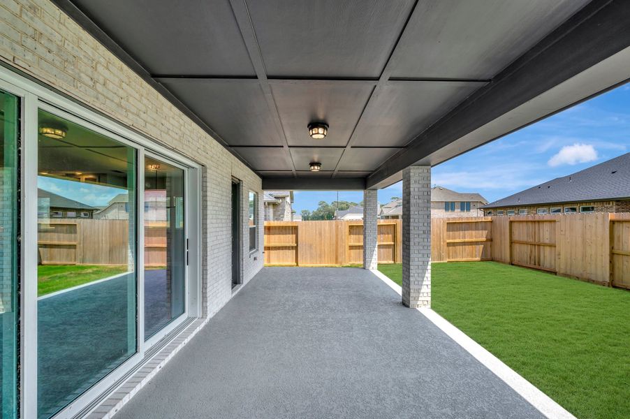 Exterior details and patio area of a home in Riceland - Summit Collection, Mont Belvieu (Image 3).