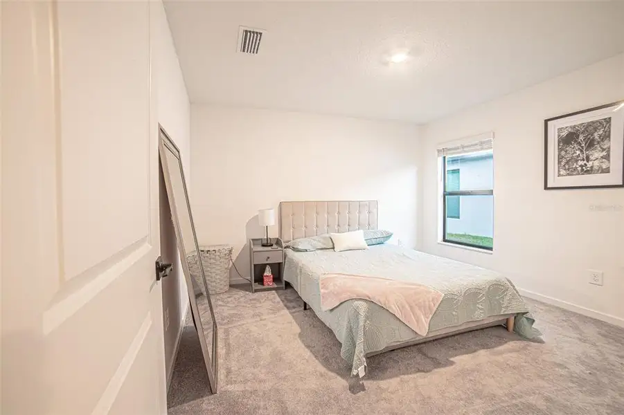 Furnished interior view inside a new home in The Crossing at Palm River, Tampa (Image 5).