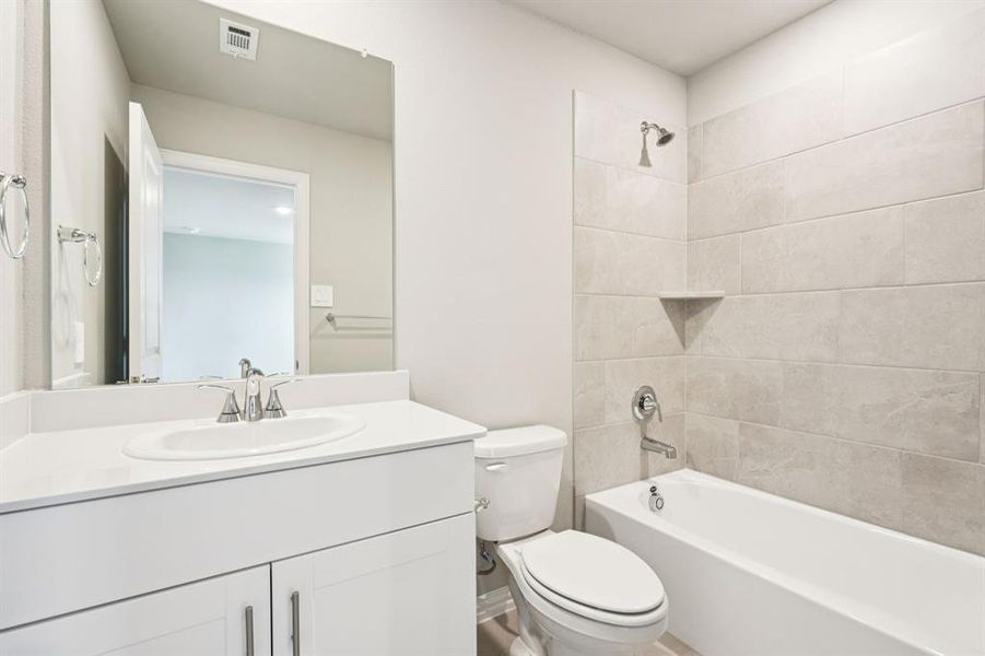 Furnished interior view inside a new home in Lakehaven - Premier Series, Farmersville (Image 13).