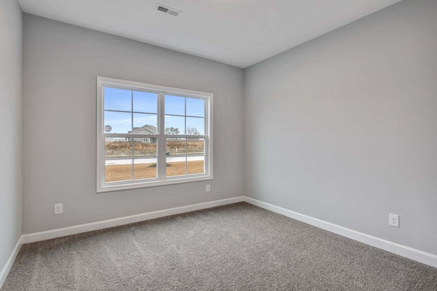 Representative unfurnished interior of a home built from the Garland by Caviness & Cates Communities in Bartlett Manor, Youngsville (Image 237). Representative unfurnished interior of a home built from the Garland by Caviness & Cates Communities in Bartlett Manor, Youngsville (Image 237).