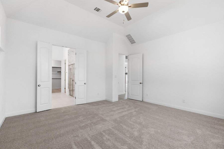 Primary Bedroom with elevated ceiling