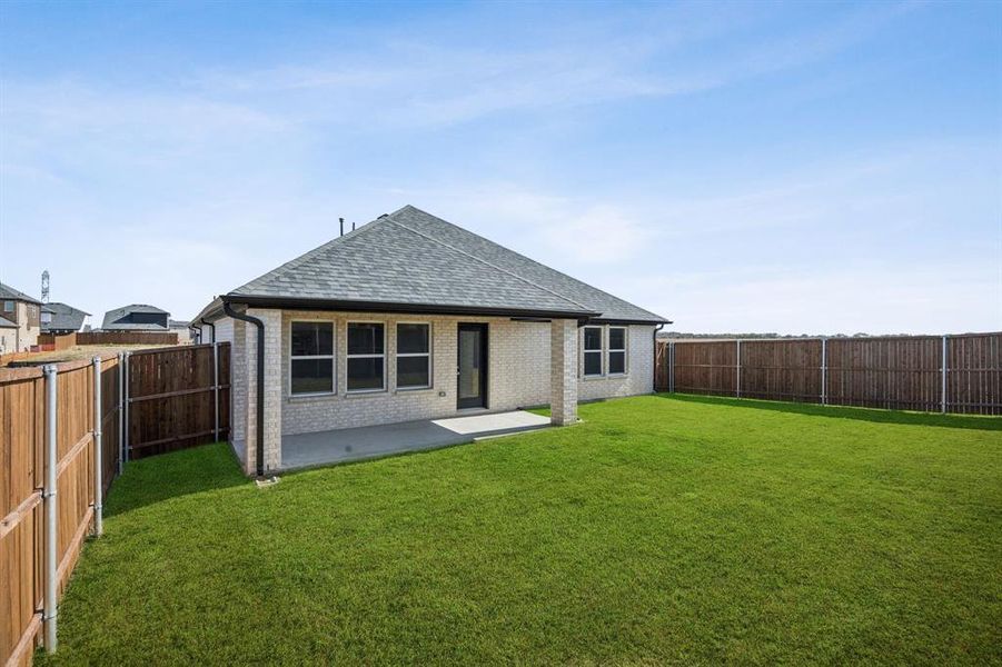 Exterior details and patio area of a home in Santorini, Seagoville (Image 16).