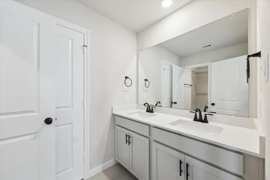 Furnished interior view inside a new home in Elyson, Katy (Image 9).