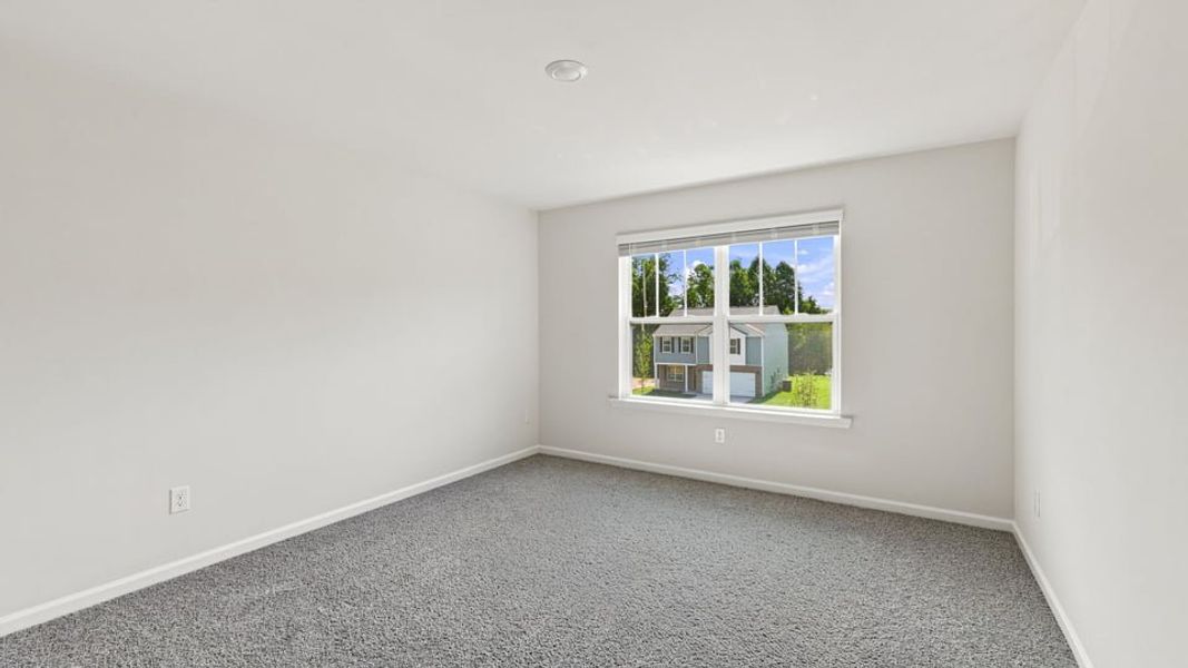 Spacious, unfurnished interior of a new home in Chestnut Ridge, Greenville (Image 31).
