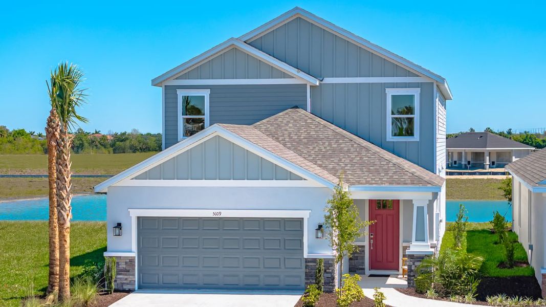 Representative exterior photo of a completed home built from the Anastasia by Taylor Morrison in Indigo Creek, Apollo Beach, FL (Image 1).