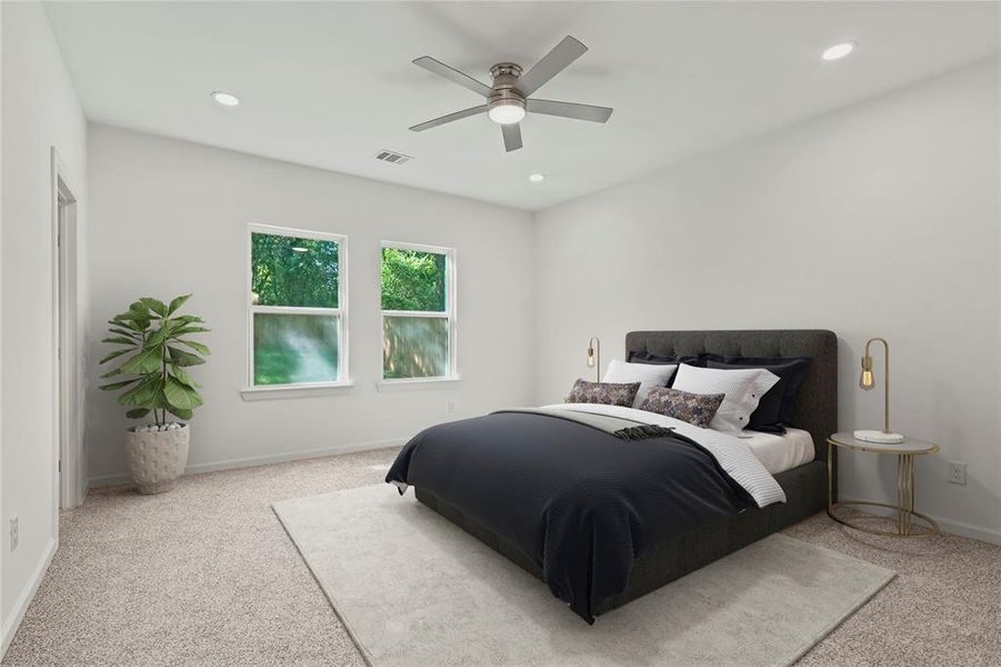 Carpeted bedroom with recessed lighting and ceiling fan