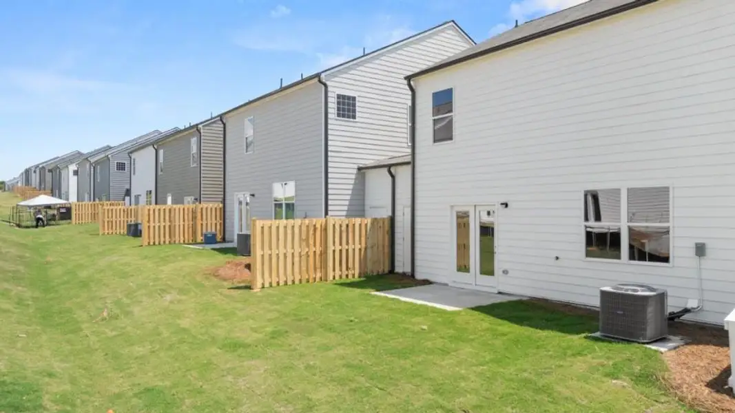 Exterior details and patio area of a home in Rolling Meadows, Jasper (Image 3).
