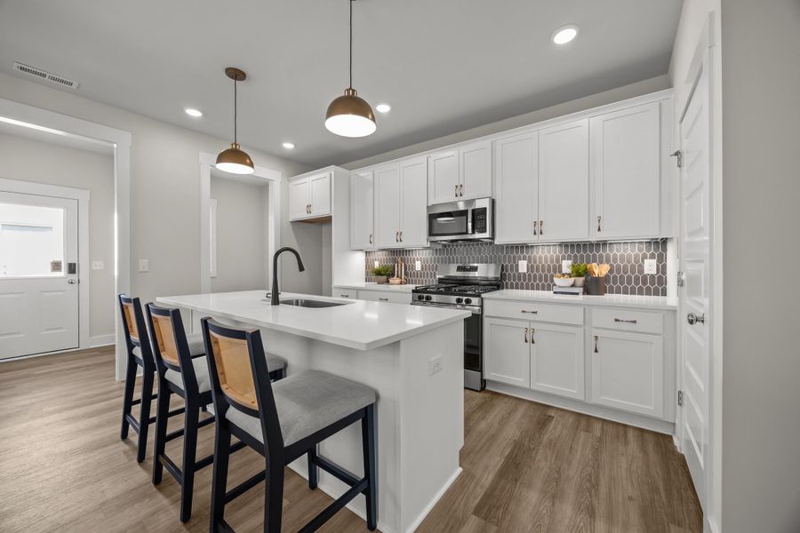 Representative furnished interior of a home built from the Storyteller by Garman Homes in Allen Park, Raleigh (Image 5). Representative furnished interior of a home built from the Storyteller by Garman Homes in Allen Park, Raleigh (Image 5).