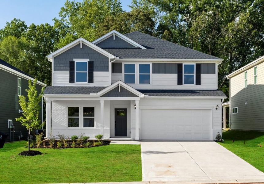 Front exterior of a new home in Riverwood Farm, Piedmont, SC, highlighting curb appeal (Image 1). Front exterior of a new home in Riverwood Farm, Piedmont, SC, highlighting curb appeal (Image 1).