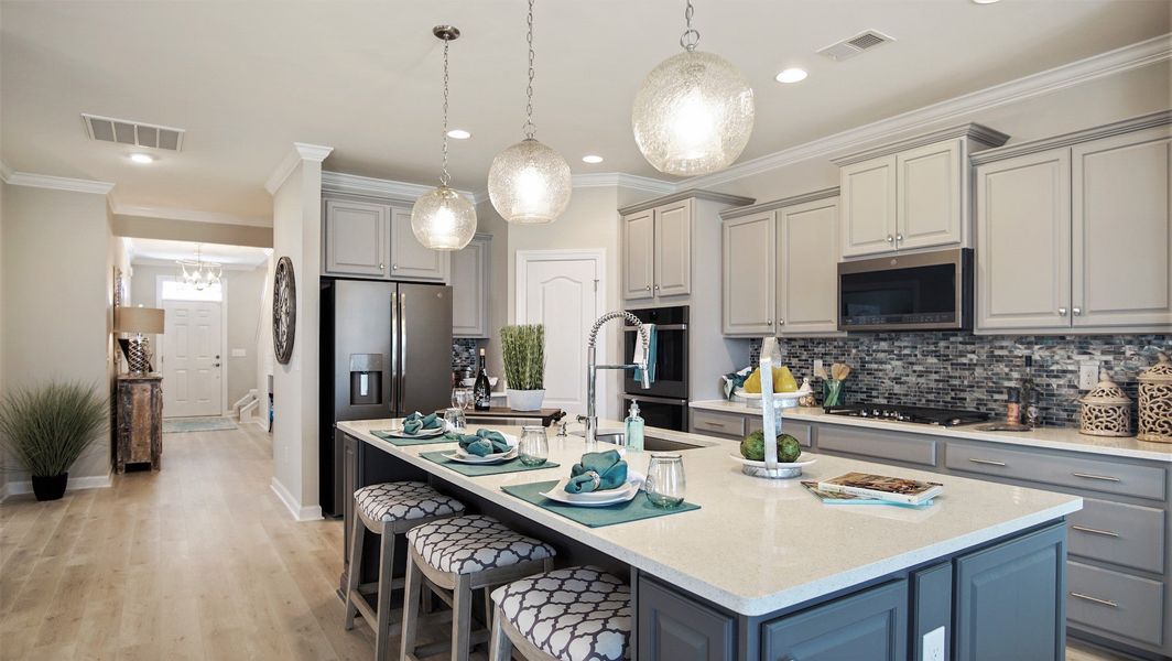 Representative furnished interior of a home built from the The Seashore Multi-Gen by Chesapeake Homes in Traditions at Carolina Forest, Myrtle Beach (Image 6). Representative furnished interior of a home built from the The Seashore Multi-Gen by Chesapeake Homes in Traditions at Carolina Forest, Myrtle Beach (Image 6).