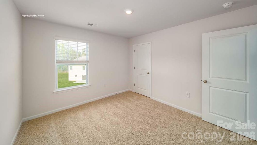 Spacious, unfurnished interior of a new home in Wallace Springs, Statesville (Image 32).