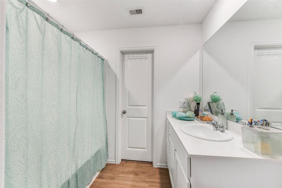 Furnished interior view inside a new home in Burnet Fields at Baytown Crossings, Baytown (Image 14).