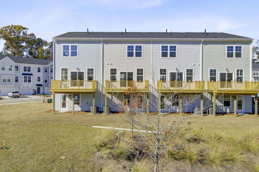 Exterior details and patio area of a home in , Johns Island (Image 20).