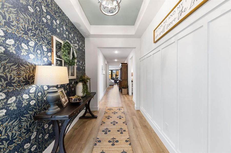 Inviting entryway with LVP flooring and direct flow into the open-concept living areas.