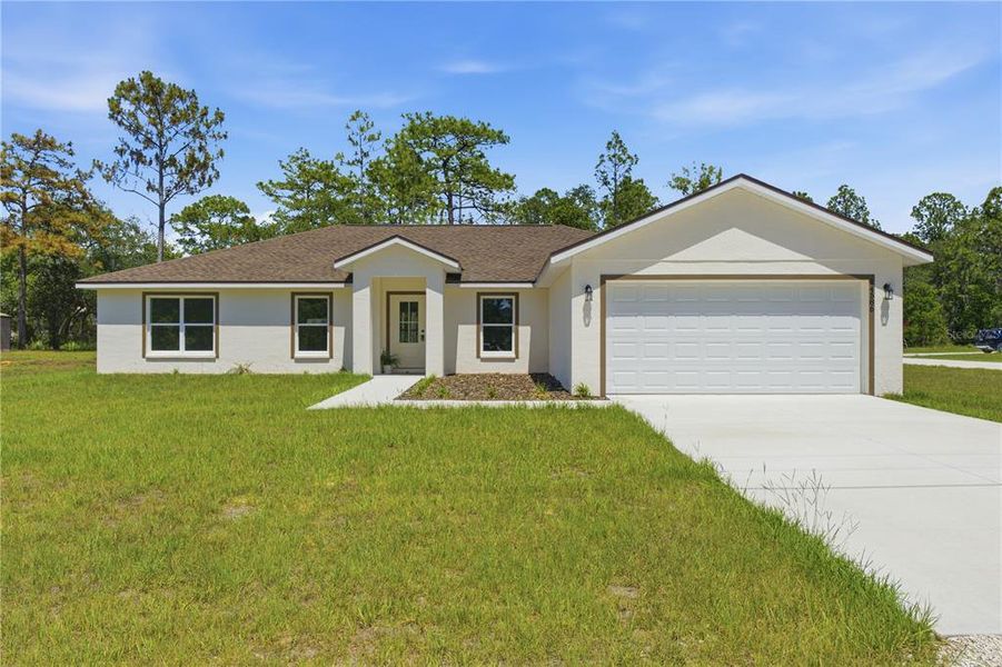 Front exterior of a new home in , Weeki Wachee, FL, highlighting curb appeal (Image 1). Front exterior of a new home in , Weeki Wachee, FL, highlighting curb appeal (Image 1).