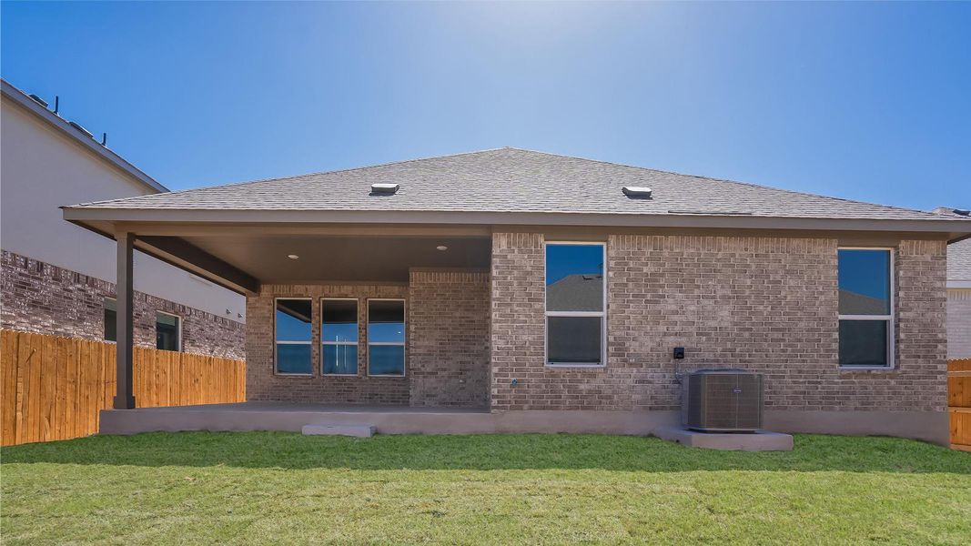 Front exterior of a new home in Rosenbusch Ranch, Leander, TX, highlighting curb appeal (Image 2). Front exterior of a new home in Rosenbusch Ranch, Leander, TX, highlighting curb appeal (Image 2).