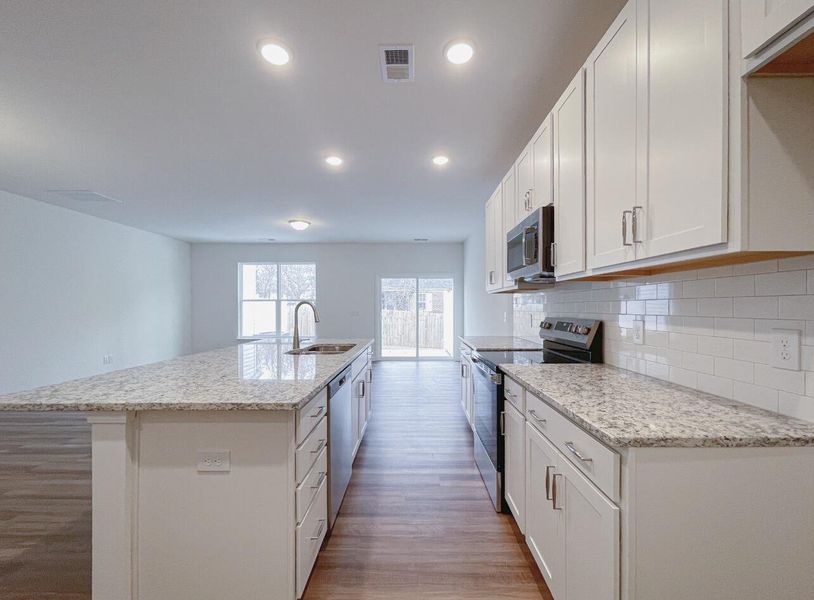 Furnished interior view inside a new home in East Main Townes, Spartanburg (Image 6).