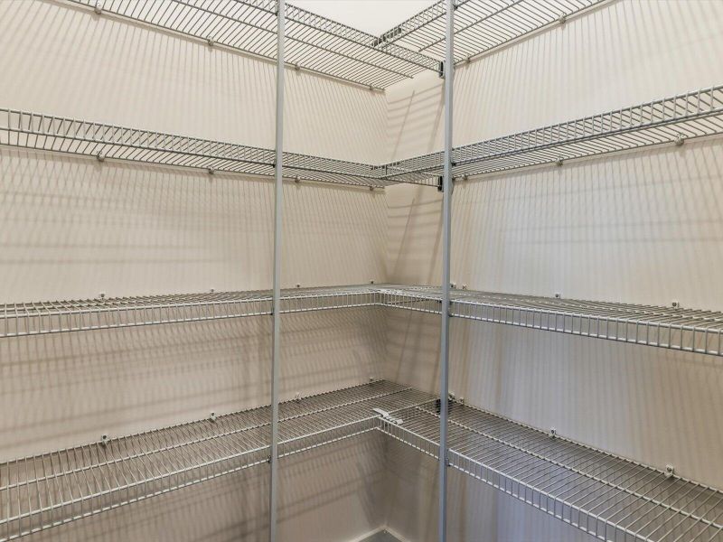 Spacious, unfurnished interior of a new home in The Coves at Lakes of Cane Bay, Summerville (Image 42).