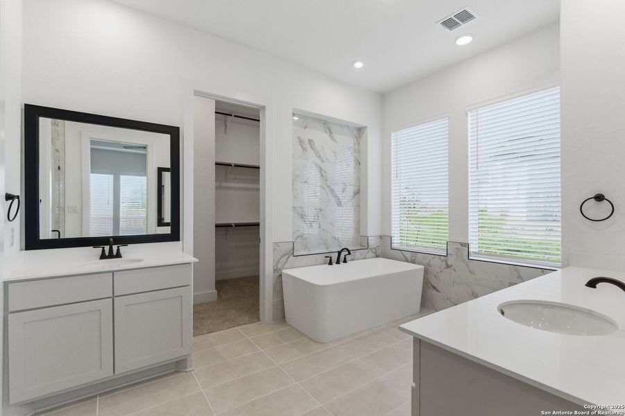 Furnished interior view inside a new home in Sienna Lakes, San Antonio (Image 6).