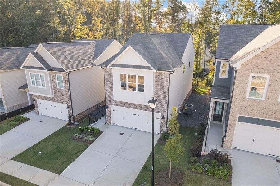 Front exterior of a new home in , Dacula, GA, highlighting curb appeal (Image 2). Front exterior of a new home in , Dacula, GA, highlighting curb appeal (Image 2).