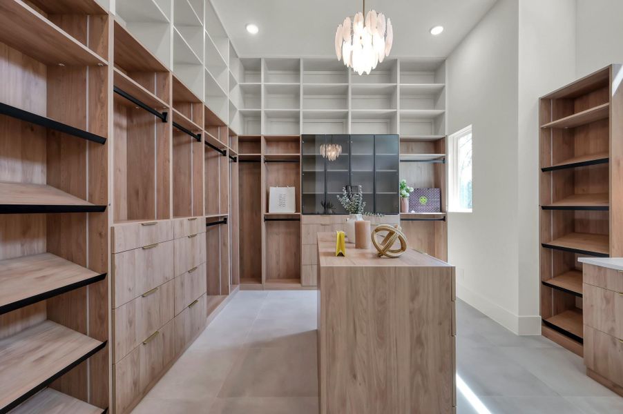 Oversized walk-in closets provide both style and functionality, with ample space for organization and everyday ease.